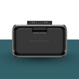 Black smart extra battery on a white and teal background