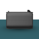 Black rectangular object on a two-tone background with a gradient from white to blue.