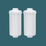 Two white cylindrical filters on a teal background