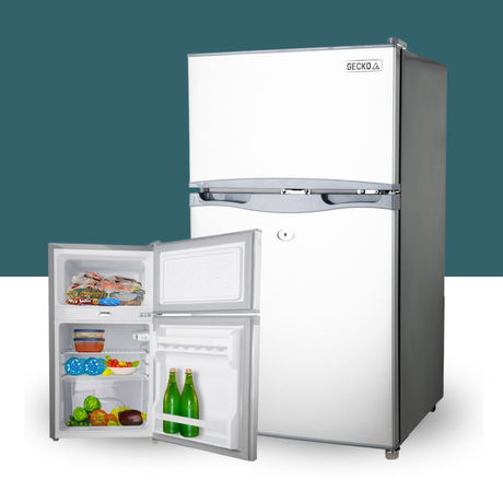 GECKO 95L 12V/24V Portable Upright Fridge Freezer with open door showing food items on a white background