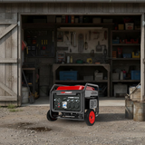 PowerGen portable generator in front of a workshop with tools and equipment.