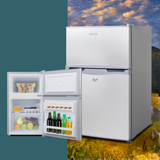 Glacio 65L 12V/24V/240V Upright Portable Fridge Freezer with open doors showing food items against a colorful sky background