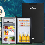 Black GLAMCIO refrigerator with open door showing food and drinks, against a scenic background.