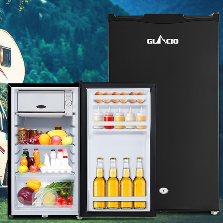 Black GLAMCIO refrigerator with open door showing food and drinks, against a scenic background.