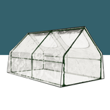 Clear greenhouse with green frame on a white background