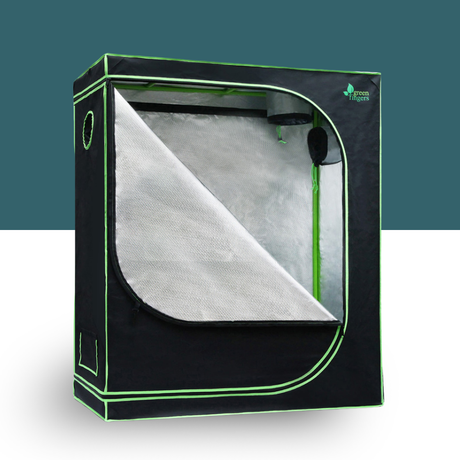Black and green grow tent with reflective interior on a white background