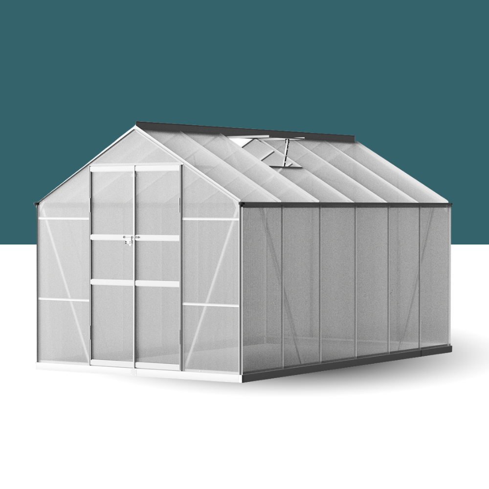 Greenhouse with transparent panels and a dark roof on a white background
