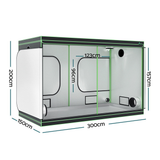 Large indoor hydroponics grow tent . The black exterior features green piping and multiple ventilation ports.