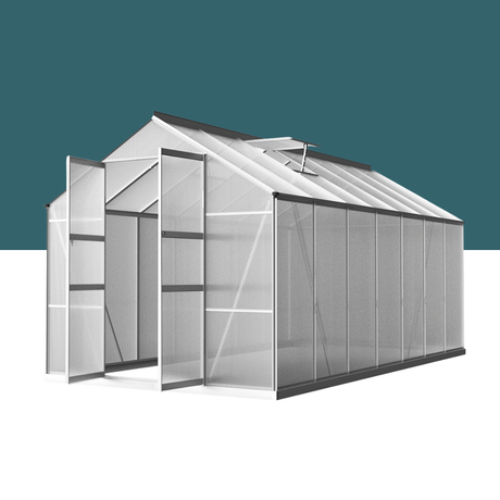 Greenhouse with transparent panels on a white background