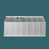 White greenhouse with transparent roof on a teal background
