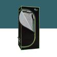 Black grow tent with green trim on a white background