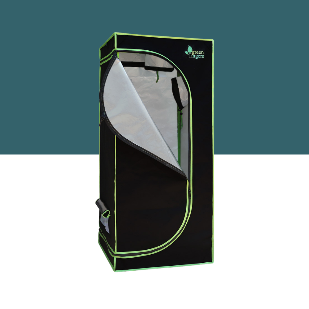 Black grow tent with green trim on a white background