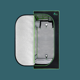 Green tent with open door on a green background