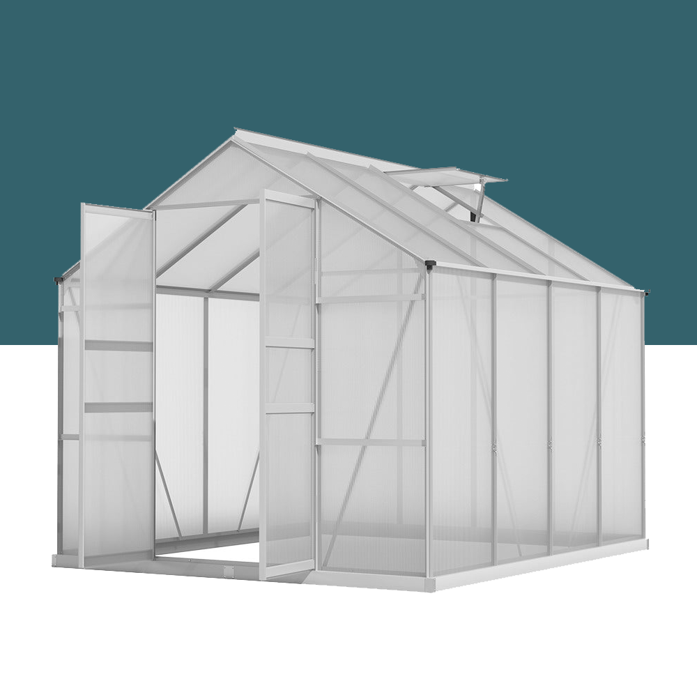 "Spacious aluminium and polycarbonate greenhouse with open doors and roof ventilation, providing a bright and airy growing space."