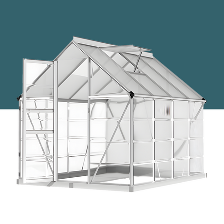 An angled view of the aluminium polycarbonate greenhouse, with an open door and transparent roof and side panels, placed against a teal background