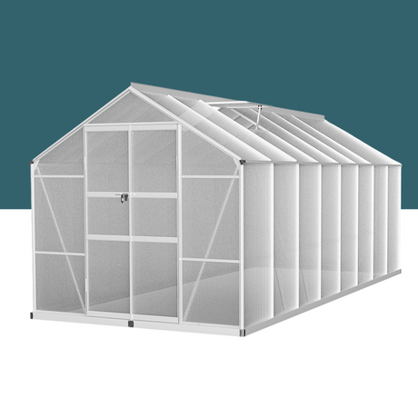 A transparent polycarbonate greenhouse with a white aluminium frame displayed on a plain teal background.