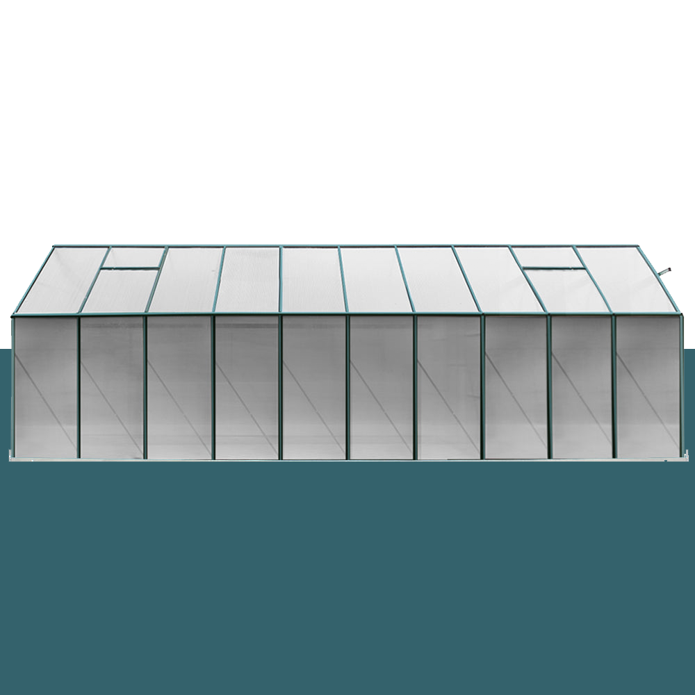 A side view of a long, spacious aluminium polycarbonate walk-in greenhouse, emphasising its sturdy structure and length.