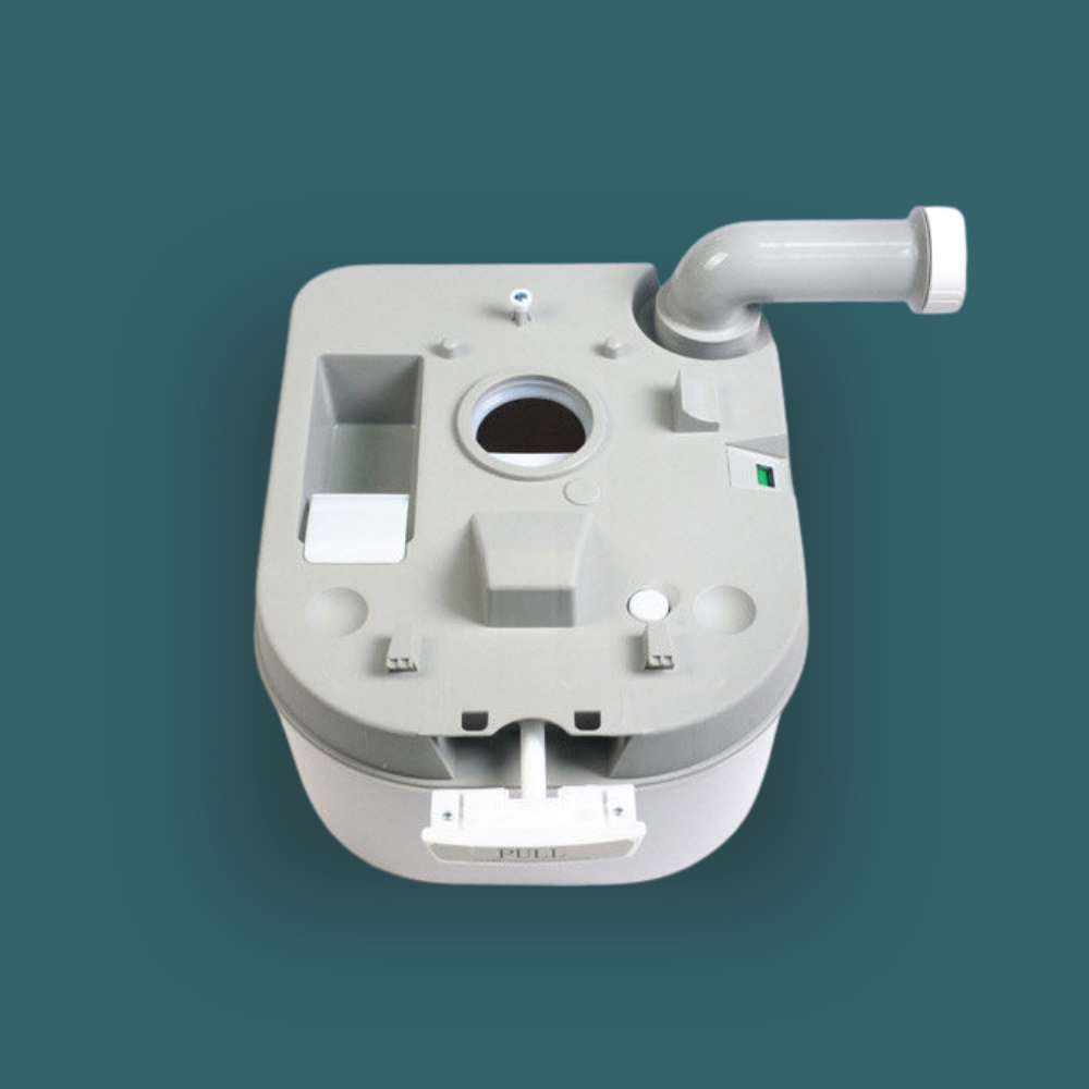 a top-down view of the detached bottom waste holding tank. It clearly shows the circular waste opening with its seal, the air relief button, and the grey rotating pour-out spout extended to the right.