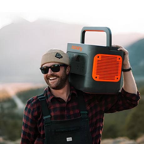 Man carries the portable power station