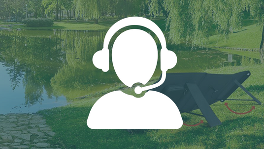 Silhouette of a customer service representative with a headset, overlaid on a serene outdoor setting near a pond, symbolising outdoor support