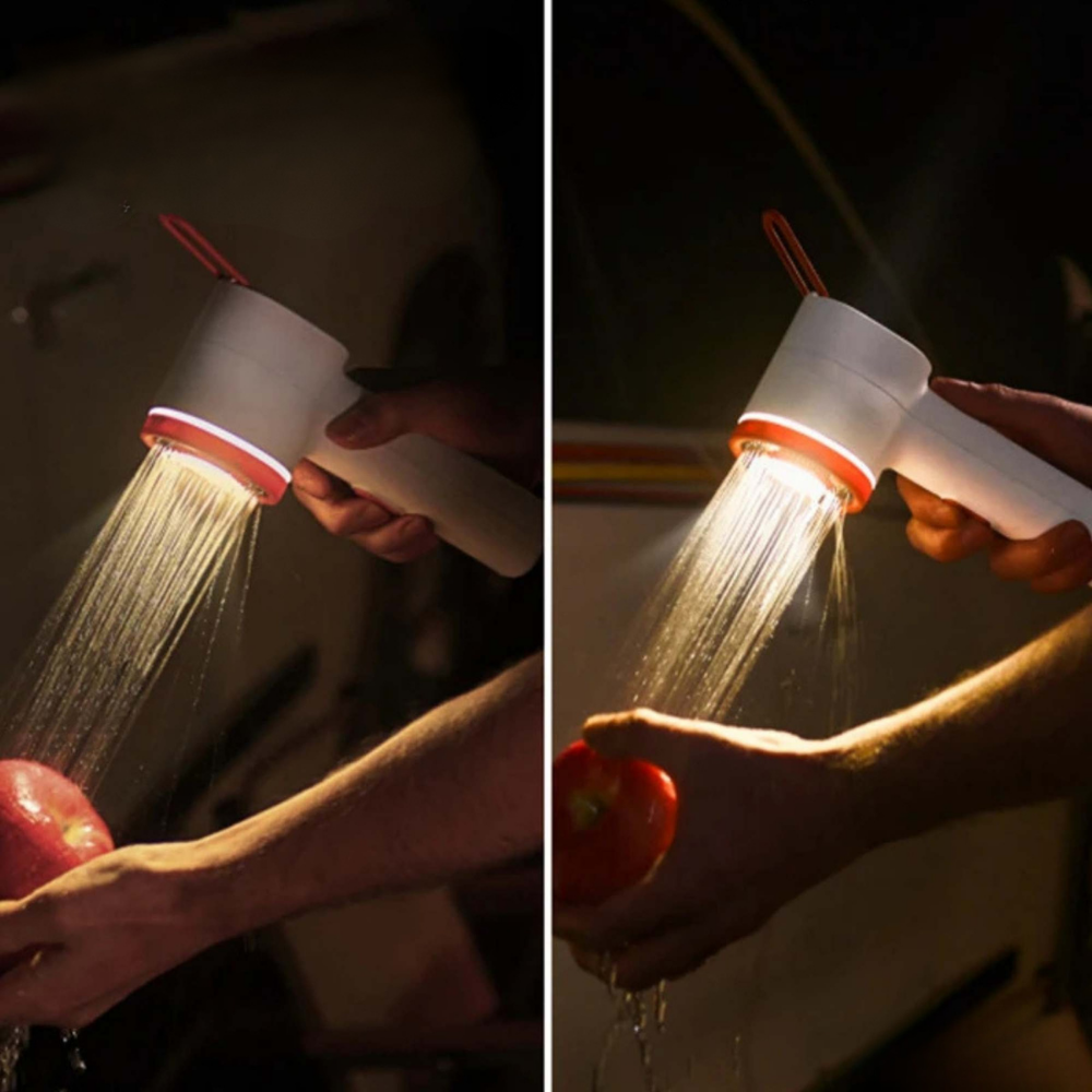 Handheld showerhead with water flow in a kitchen setting
