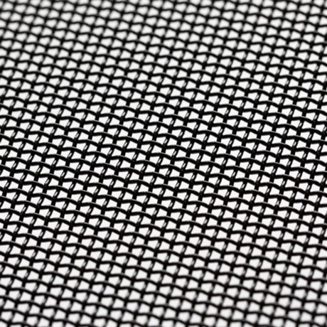 Close-up of a black metal mesh pattern