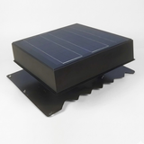 A black solar roof vent with a flashing base on a white background