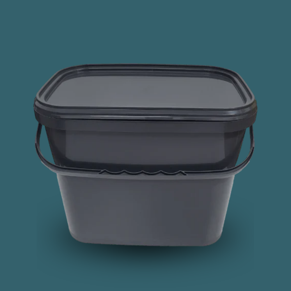 Trelino® Composting Toilet Solid Waste Container With Lid - Black on a dark green background