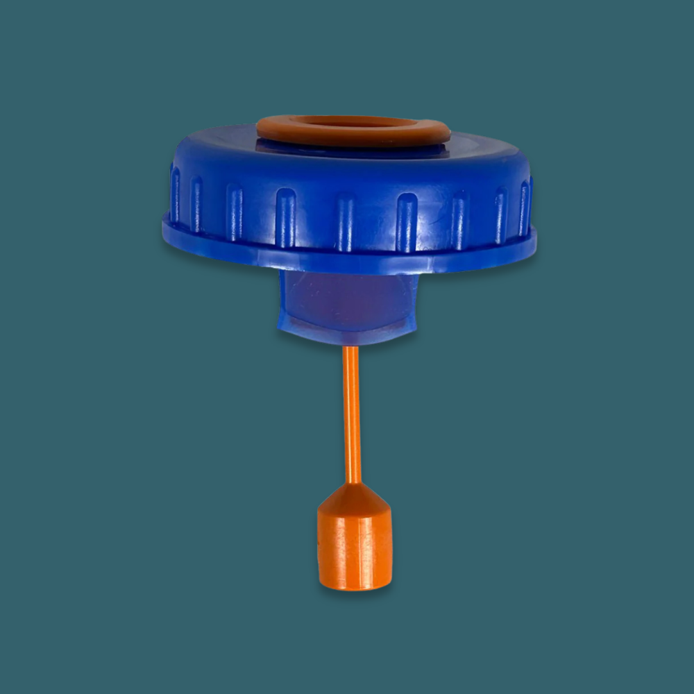 Blue and orange plastic component on a dark teal background