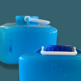 Two blue plastic containers with white lids on a dark background