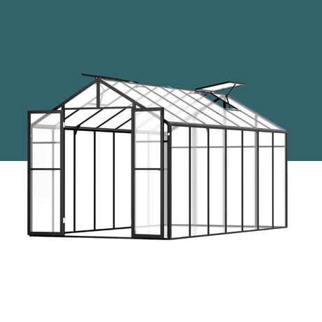 Glass greenhouse with black metal frame on a white background