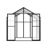 Black-framed greenhouse structure on a white background
