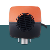 Black and orange device with a metallic base on a two-tone background
