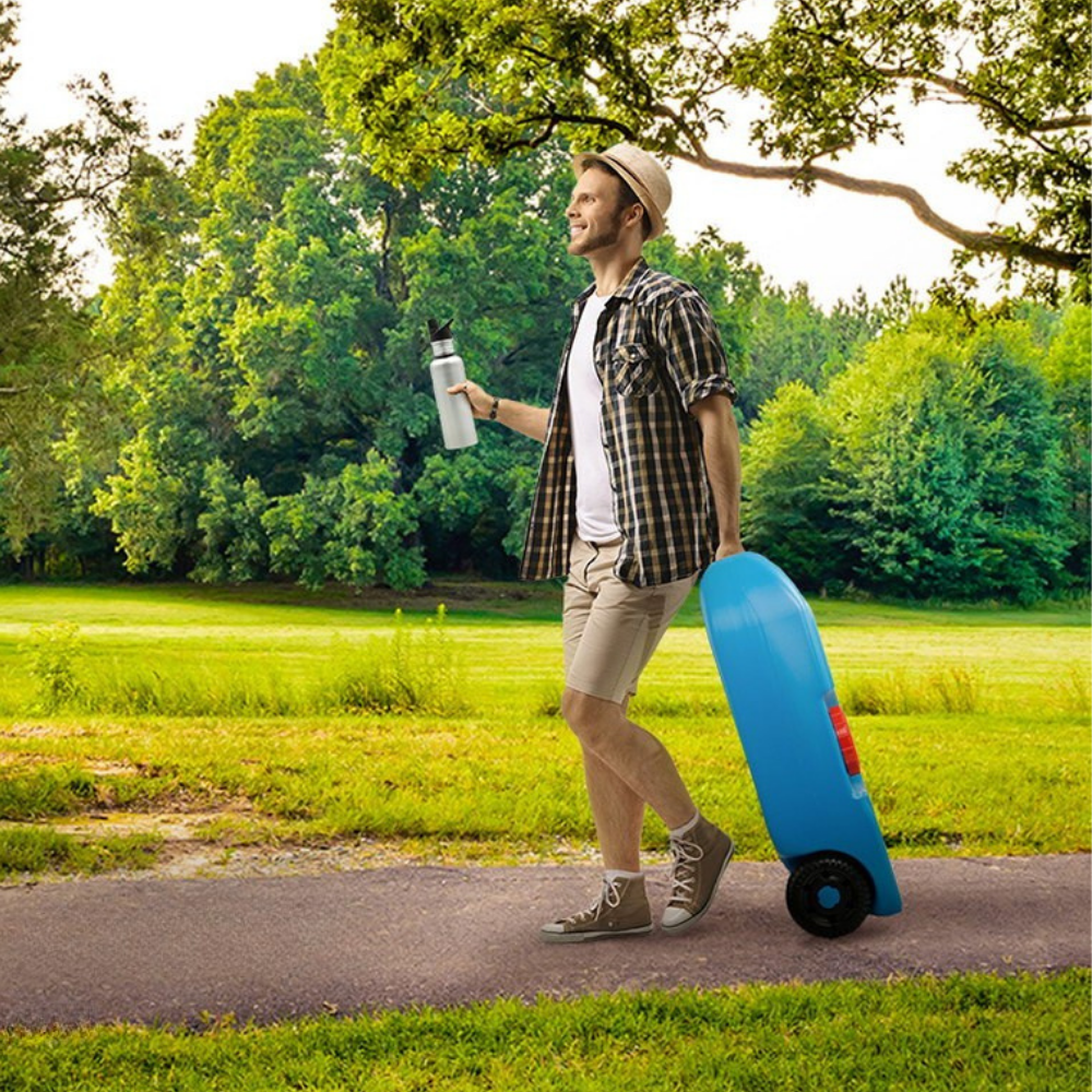 Man walking with a blue water tank and water bottle in a park