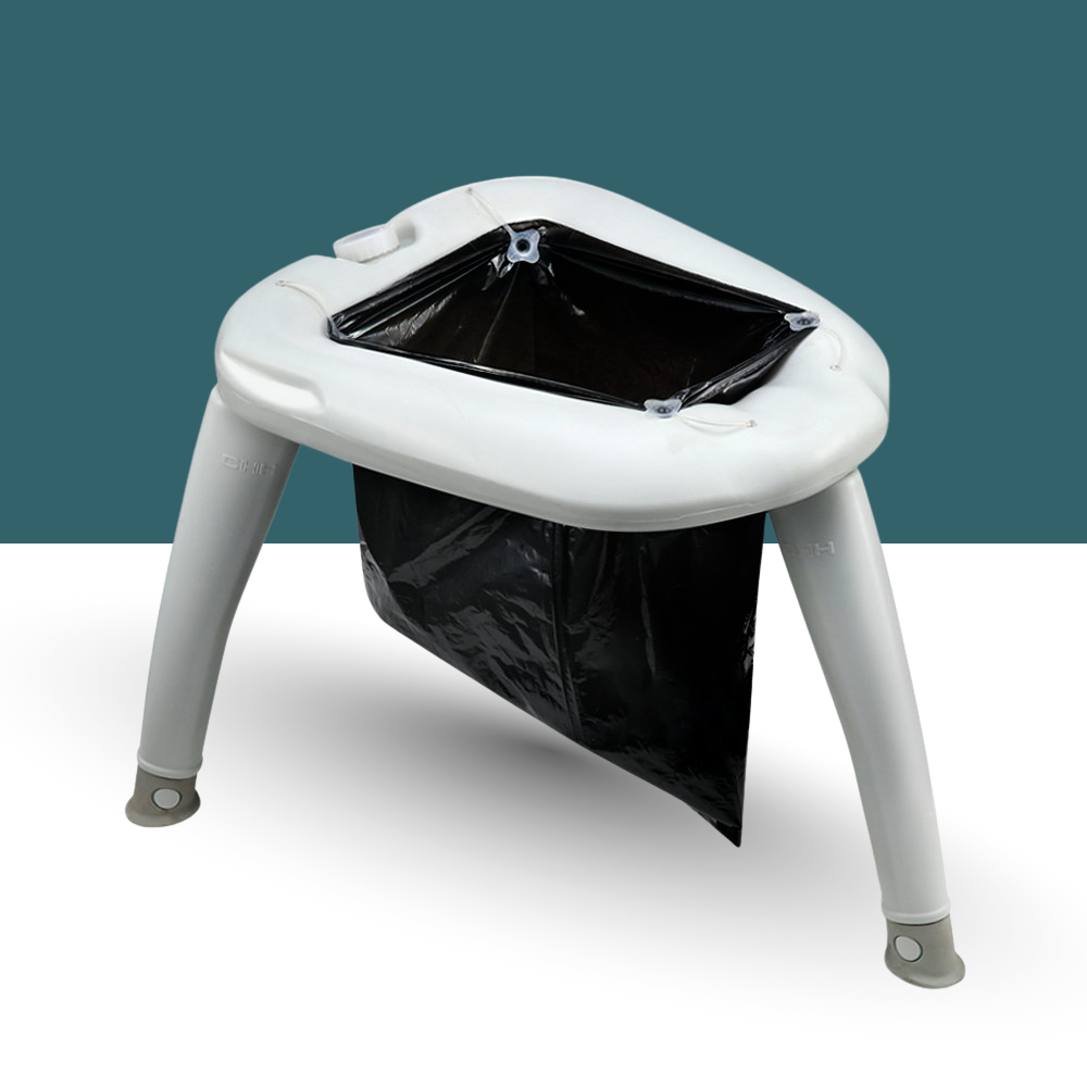 White plastic stool with a black trash bag inside on a white background